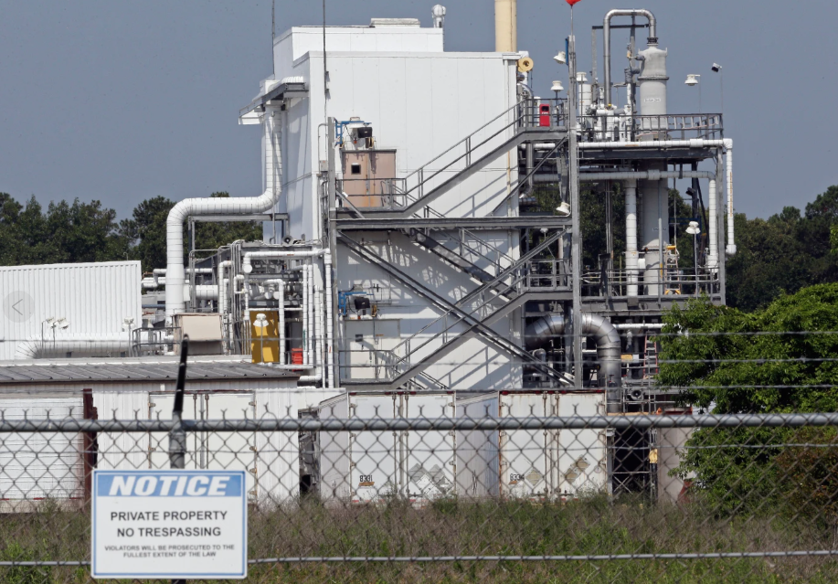 Manufacturing facility with stairs and no trespassing sign